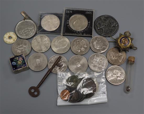 A collection of coins and two Post Office savings money boxes